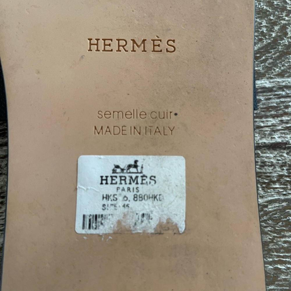 Hermes sandals size 46/13 black w/ orange inner sole. Excellent condition.